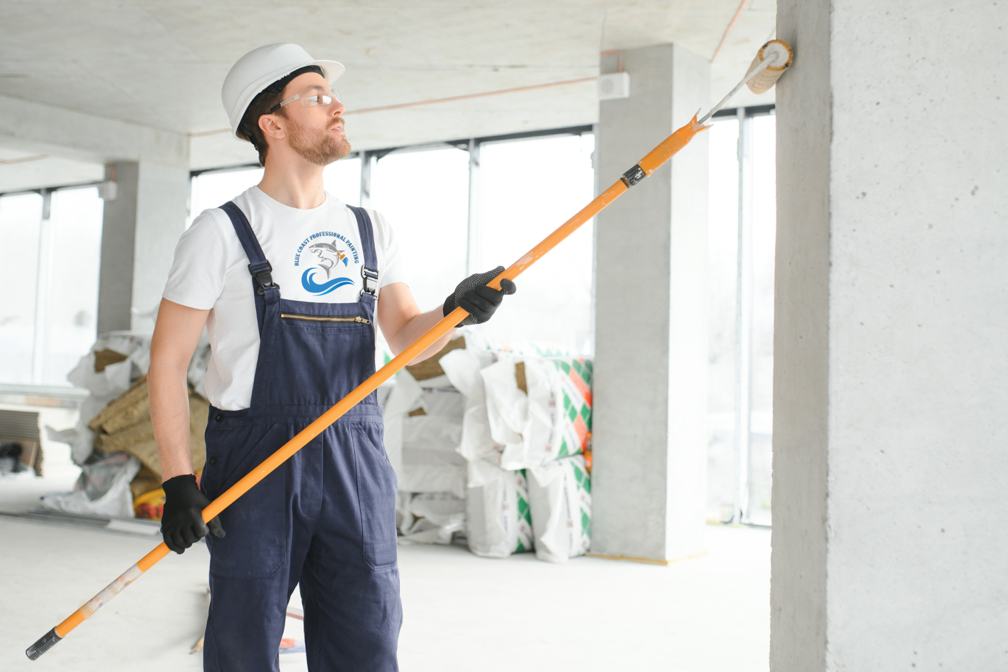 A painter doing interior commercial painting in Los Angeles, California.