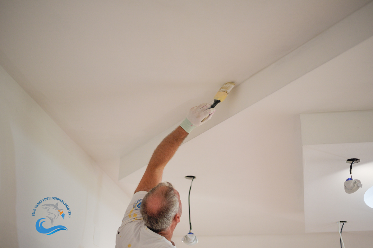 A painter painting a ceiling in Pacific Palisades, California.