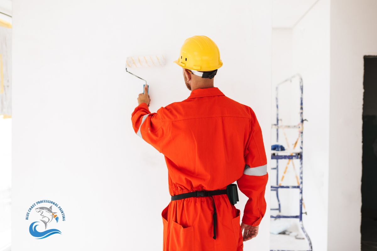 A painter painting the interior of a house in Pasadena, California.