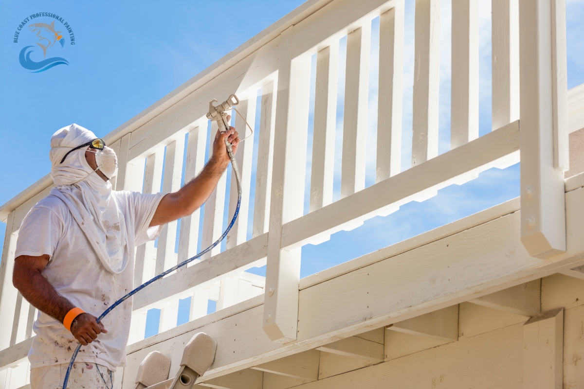 A professional painter painting a wooden railing in Bellflower, California.